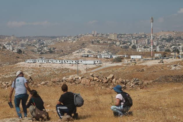 Israeli violations against Palestinians continue HEBRON, WEST BANK, PALESTINE - AUGUST 14: Palestinians and foreign activists gather to protest in support of their land, which they say is under threat of being seized by Israelis, and to express their determination not to leave their properties in Beit Sahour, Hebron Governorate, West Bank, on August 14, 2026. Armed Israelis who came to the area intervened and attempted to disperse the group. Mamoun Wazwaz Anadolu Hebron West Bank. Editorial use only. Please get in touch for any other usage.  Copyright: x2026xAnadoluxMamounxWazwazx
