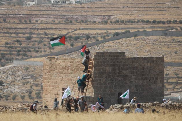 Israeli violations against Palestinians continue HEBRON, WEST BANK, PALESTINE - AUGUST 14: Palestinians and foreign activists gather to protest in support of their land, which they say is under threat of being seized by Israelis, and to express their determination not to leave their properties in Beit Sahour, Hebron Governorate, West Bank, on August 14, 2026. Armed Israelis who came to the area intervened and attempted to disperse the group. Mamoun Wazwaz Anadolu Hebron West Bank. Editorial use only. Please get in touch for any other usage.  Copyright: x2026xAnadoluxMamounxWazwazx