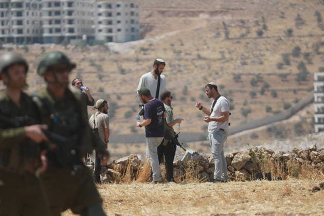 Israeli violations against Palestinians continue HEBRON, WEST BANK, PALESTINE - AUGUST 14: Palestinians and foreign activists gather to protest in support of their land, which they say is under threat of being seized by Israelis, and to express their determination not to leave their properties in Beit Sahour, Hebron Governorate, West Bank, on August 14, 2026. Armed Israelis who came to the area intervened and attempted to disperse the group. Mamoun Wazwaz Anadolu Hebron West Bank. Editorial use only. Please get in touch for any other usage.  Copyright: x2026xAnadoluxMamounxWazwazx