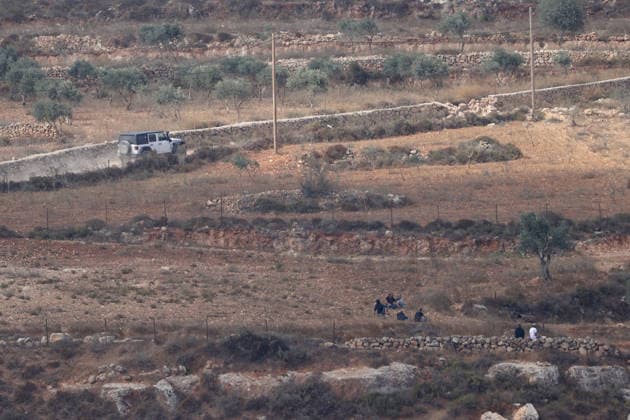 Activists attempt to deliver supplies to Palestinian families near Nablus NABLUS, WEST BANK, PALESTINE - AUGUST 14: Palestinian, Israeli and foreign activists attempt to deliver basic supplies to three Palestinian families living in the Ras al-Ayn area of Qusra, south of Nablus in the West Bank, Palestine, on August 14, 2026, as Israelis have blocked roads leading to the families’ homes since August 9, restricting access to and from the area in the presence of Israeli soldiers, with the restrictions remaining in place. Issam Rimawi Anadolu Nablus West Bank. Editorial use only. Please get in touch for any other usage.  Copyright: x2026xAnadoluxIssamxRimawix