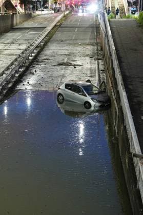 Aftermath of torrential rain in Chiba A vehicle is seen stranded at a flooded underpass in Chiba, near Tokyo, on Aug. 14, 2026, following torrential rain overnight.  A14AA0005625821P