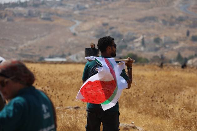 Activists remove Israeli flags from Palestinian home in Beit Sahour BEIT SAHOUR, WEST BANK, PALESTINE, AUGUST 14, 2026: Palestinian and Israeli activists remove an Israeli Star of David and Israeli flags from a Palestinian home in Beit Sahour, east of Bethlehem. The activists said the flags and emblem had been placed on the house by Israeli settlers since October 7, 2023, in what they described as an attempt to take control of the property. According to the activists, settlers arrived at the site as the flags were being removed and opened fire in their direction. No injuries were reported. BEIT SAHOUR Palestine, State of Copyright: x xMosabxshawerx xJNAxPressx