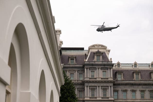 Marine One flies over the Eisenhower Executive Office Building and the White House in Washington, DC on Friday, August 14, 2026. Copyright: xAnnabellexGordonx xPoolxviaxCNPx MediaPunchx