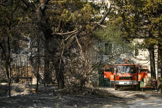 Aftermath of wildfire near Croatia s Omis OMIS, CROATIA - AUGUST 14: An aftermath view of wildfire near Omis, Croatia on August 14, 2026. Samir Jordamovic Anadolu Omis Croatia. Editorial use only. Please get in touch for any other usage.  Copyright: x2026xAnadoluxSamirxJordamovicx