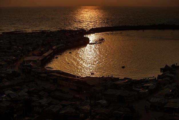 Daily life in Gaza amid the ongoing Israeli attacks despite ceasefire GAZA CITY, GAZA, PALESTINE - AUGUST 14: Displaced Palestinians living along the coastal strip of blockaded Gaza City carry out daily activities among the ruins of destroyed buildings during sunset in Gaza, Palestine on August 14, 2026. Deprived of basic necessities following Israeli attacks, families struggle to survive in makeshift tents pitched near the rubble of their homes and inside heavily damaged structures under severe conditions. Ali Jadallah Anadolu Gaza City Gaza. Editorial use only. Please get in touch for any other usage.  Copyright: x2026xAnadoluxAlixJadallahx