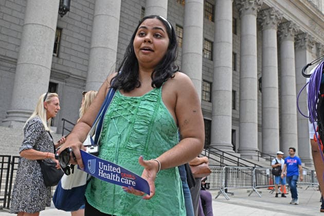 August 14, 2026, New York, New York, USA: August 14, 2026 - New York, NY, USA - Mangione supporter seen after Luigi Mangione enters an open guilty plea in federal court, admitting to all charges without any accommodations. He faces a maximum penalty of life in prison for the assassination of United Healthcare CEO, Brian Thompson on a Manhattan street. (Andrea RENAULT Zuma Press) New York USA  - ZUMAg115 20260814_faf_g115_003 Copyright: xAndreaxRenaultx