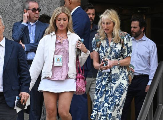 August 14, 2026, New York, New York, USA: August 14, 2026 - New York, NY, USA - Mangione supporter-in pink - seen after Luigi Mangione enters an open guilty plea in federal court, admitting to all charges without any accommodations. He faces a maximum penalty of life in prison for the assassination of United Healthcare CEO, Brian Thompson on a Manhattan street. (Andrea RENAULT Zuma Press) New York USA - ZUMAg115 20260814_faf_g115_011 Copyright: xAndreaxRenaultx