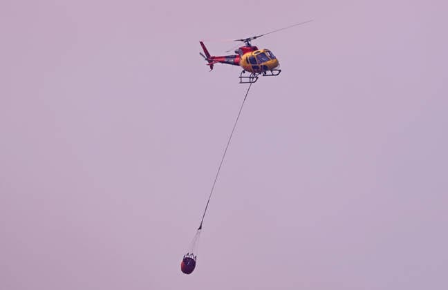 Forest Fire In The Upper Part Of Barcelona Firefighters deployed 10 fire engines and four helicopters and brought the fire under control after four hours of work in Barcelona, Spain, on August 14, 2026. More than 500 wildfires have been recorded in Catalonia this summer. One of the latest broke out in the Collserola mountain range, near a telecommunications tower overlooking Barcelona. The blaze burned 10 hectares and threatened populated areas, prompting authorities to order residents in Barcelona s upper neighborhoods to remain indoors Barcelona Barcelona Spain  Copyright: xUrbanandsportx originalFilename: urbanandsport-forestfi260814_nptlu.jpg