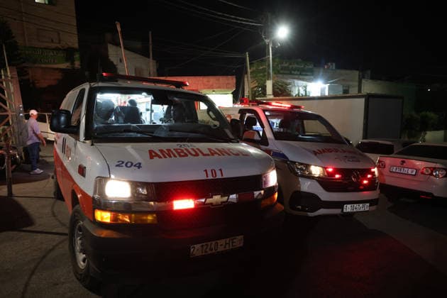 Sair Settler Attack Injures Palestinians Ambulances are parked outside a hospital after an attack in Sa™ir, east of Hebron in the occupied West Bank, on August 14, 2026. The three Palestinians were wounded when settlers opened fire during the attack on the town, according to information provided by the photographer. Hebron West Bank Palestinian Territories Copyright: xMosabxShawerx