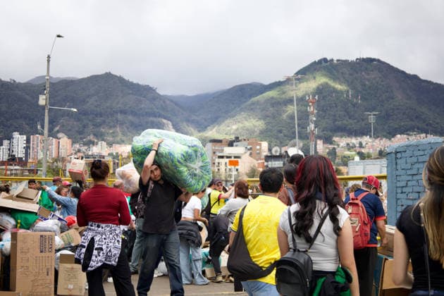 August 14, 2026, Bogota, Bogota D.C, Colombia: People in Bogota, Colombia gather to collect and categorize donations for the victims of the 7,4 earthquake that struck Colombia on August 10 outside El Campin Stadium on August 14, 2026. Bogota Colombia - ZUMAvp1_ 20260814_zia_vp1_014 Copyright: xIsabellaxBobadillax