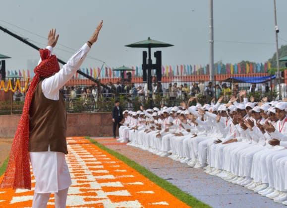 Indian Prime Minister Modi addresses nation on India s Independence Day NEW DELHI, INDIA - AUGUST 15: Indian Prime Minister Narendra Modi greets school children after addressing the nation during Independence Day celebrations at the Red Fort in New Delhi, India, on August 15, 2026. Modi hoisted the national flag at the 17th-century monument and addressed the nation, marking 80 years of Indian independence from British colonial rule since 1947. Imtiyaz Khan Anadolu New delhi India. Editorial use only. Please get in touch for any other usage.  Copyright: x2026xAnadoluxImtiyazxKhanx