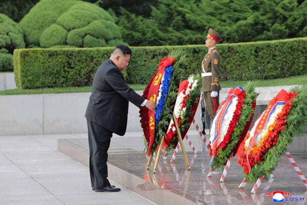 (260815) -- PYONGYANG, Aug. 15, 2026 -- This photo provided by the Korean Central News Agency (KCNA) on Aug. 15, 2026 shows Kim Jong Un, general secretary of the Workers Party of Korea and president of the State Affairs of the Democratic People s Republic of Korea (DPRK), visiting the Revolutionary Martyrs Cemetery on Mt. Taesong in the DPRK, Aug. 14, 2026. Kim visited the Revolutionary Martyrs Cemetery on Mt. Taesong on Friday on the occasion of the 81st anniversary of national liberation, the KCNA reported. (KCNA Handout via Xinhua) DPRK-KIM JONG UN-ANTI-JAPANESE REVOLUTIONARY MARTYRS-TRIBUTE WangxTianliao 