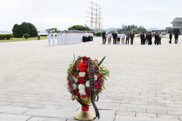 NORTH KOREA, WONSAN - AUGUST 15, 2026: A wreath laying ceremony at the Wonsan Bronze Statues of Kim Il Sung and Kim Jong Il held after the arrival of the Russian training tallship Pallada. The ship arrived in the Democratic People s Republic of Korea on a friendly visit for festivities marking the 81st anniversary of the liberation of Korea from Japanese occupation, on 15 August. Stanislav Varivoda TASS  96177053