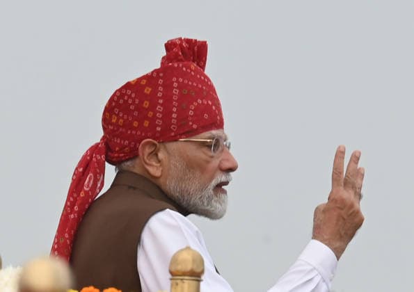 NEW DELHI, INDIA - AUGUST 15: Prime Minister Narendra Modi addresses the nation during Independence Day celebrations at the Red Fort on August 15, 2026 in New Delhi, India. For the first time, the national song, Vande Mataram , was rendered during the celebrations at the Red Fort. The National Anthem rendition was synchronised with the 21-gun salute by the gunners of the 1721 Field Battery (Ceremonial), utilising the indigenous 105mm Light Field Guns. PM Modi announced a nationwide initiative to provide free online coaching for competitive exams during his Independence Day address on August 15, 2026. The scheme aims to leverage India s digital infrastructure and top educators to ease the heavy financial burden private coaching hubs place o