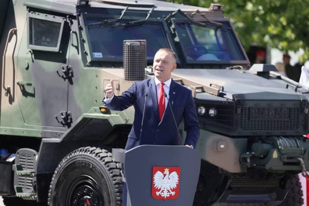 Polish Armed Forces Day celebrations Photo: Wojciech Olkusnik East News Polish president Karol Nawrocki deliveres a speech during the central military parade marking the Polish Armed Forces Day and 106th anniversary of 1920 victory over Soviet Russia at the Battle of Warsaw during the Polish?Soviet War on August 15, 2026 in Warsaw, Poland. EN_01682638_0163 