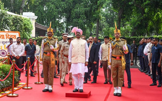 80th Independence Day Celebrations in New Delhi New Delhi, Aug 15 (ANI): Lok Sabha Speaker Om Birla stands on a saluting dais as he receives the Guard of Honour during the 80th Independence Day celebrations at his residence, in New Delhi on Saturday. NEW DELHI Delhi India Copyright: xANIx ANI_20260815527