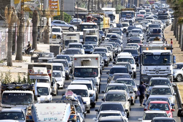 A new wave of displacement has begun following attacks launched by Israel on southern Lebanon, despite the ceasefire SIDON, LEBANON - AUGUST 15: Lebanese families drive through the streets of Sidon (Saida), southern Lebanon, with their vehicles packed with personal belongings as they head north toward safer areas on August 15, 2026. Heavy traffic and gridlock mounted along main coastal roads as civilians fled continued Israeli strikes on southern Lebanese towns despite the existing ceasefire agreement, causing renewed waves of internal displacement across the country. Houssam Shbaro Anadolu Sidon Lebanon. Editorial use only. Please get in touch for any other usage.  Copyright: x2026xAnadoluxHoussamxShbarox