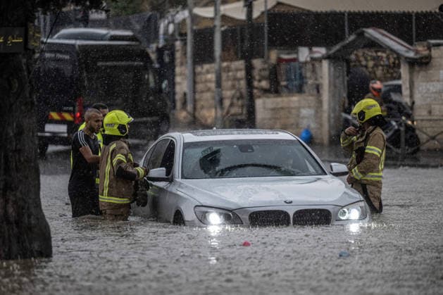 Flash floods submerge vehicles in East Jerusalem neighborhood following heavy rainfall EAST JERUSALEM - AUGUST 15: Submerged vehicles are seen in the Wadi al-Joz neighborhood of East Jerusalem on August 15, 2026, after unseasonal heavy rainfall triggered localized flash flooding across the area. Search and rescue teams were dispatched to the district as rising waters trapped cars, disrupted traffic flow, and damaged infrastructure across low-lying urban streets. Mostafa Alkharouf Anadolu Jerusalem Israel. Editorial use only. Please get in touch for any other usage.  Copyright: x2026xAnadoluxMostafaxAlkharoufx