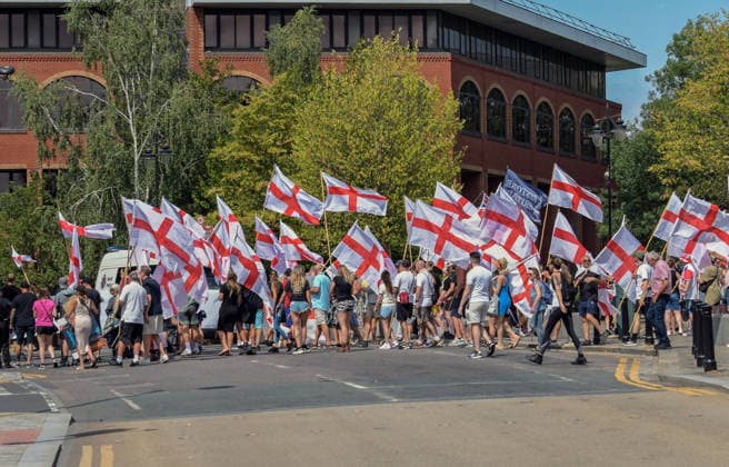 Anti-immigration demonstrators and Stand Up to Racism counter-protesters rally in Maidstone MAIDSTONE, UNITED KINGDOM - AUGUST 15: Demonstrators from the far-right Kent Nationalist Movement gather outside County Hall in Maidstone, Kent, England, United Kingdom on August 15, 2026, before marching through the town center. The marchers voiced opposition to government border policies, asylum seeker housing programs, and mass migration. A counter-demonstration organized by Stand Up to Racism assembled nearby, with activists chanting slogans and displaying placards to denounce far-right activity and express solidarity with refugees as police officers maintained a presence to keep the opposing groups separated. Stuart Brock Anadolu Maidstone Uni  Copyright: x2026xAnadoluxStuartxBrockx