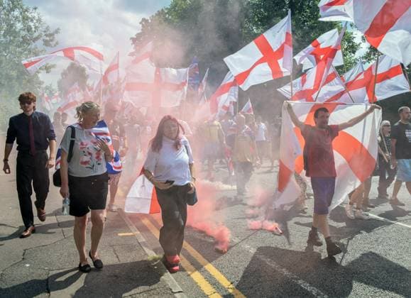 Anti-immigration demonstrators and Stand Up to Racism counter-protesters rally in Maidstone MAIDSTONE, UNITED KINGDOM - AUGUST 15: Demonstrators from the far-right Kent Nationalist Movement gather outside County Hall in Maidstone, Kent, England, United Kingdom on August 15, 2026, before marching through the town center. The marchers voiced opposition to government border policies, asylum seeker housing programs, and mass migration. A counter-demonstration organized by Stand Up to Racism assembled nearby, with activists chanting slogans and displaying placards to denounce far-right activity and express solidarity with refugees as police officers maintained a presence to keep the opposing groups separated. Stuart Brock Anadolu Maidstone Uni  Copyright: x2026xAnadoluxStuartxBrockx