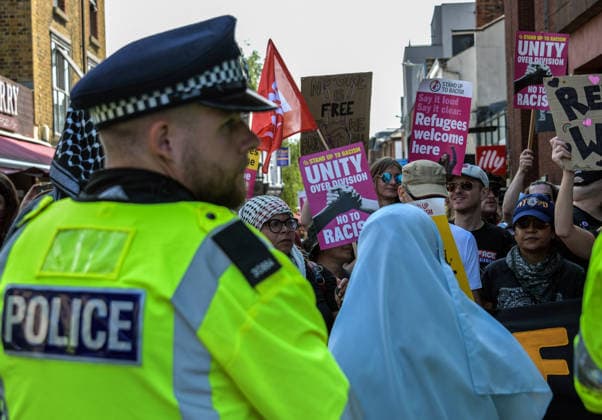 Anti-immigration demonstrators and Stand Up to Racism counter-protesters rally in Maidstone MAIDSTONE, UNITED KINGDOM - AUGUST 15: Activists from Stand Up to Racism assemble outside County Hall in Maidstone, Kent, United Kingdom, on August 15, 2026, to counter-protest against the far-right Kent Nationalist Movement as they gathered before marching through the town center. While the far-right group voiced opposition to government border policies, asylum seeker housing programs, and mass migration, Stand Up to Racism demonstrators chanted slogans and displayed placards to denounce far-right activity and express solidarity with refugees, with police officers maintaining a presence to keep the opposing groups separated. Stuart Brock Anadolu M  Copyright: x2026xAnadoluxStuartxBrockx