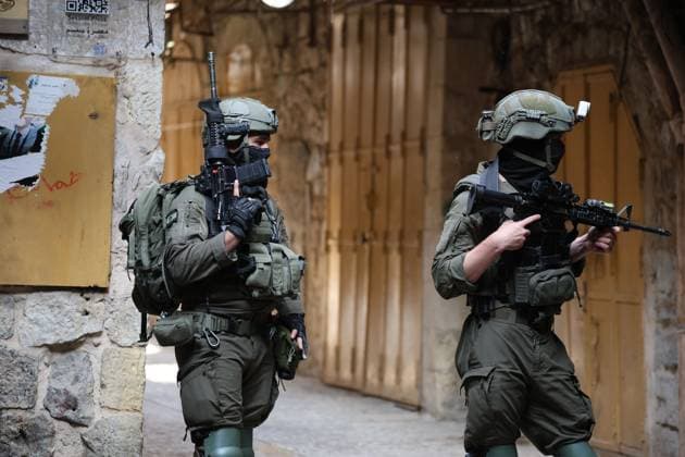 Israeli settlers enter Hebron™s Old City under army protection HEBRON, WEST BANK, PALESTINE, AUGUST 15, 2026: Israeli settlers enter the Old City of Hebron under the protection of Israeli soldiers, while Palestinians, including women and children, are prevented from reaching their homes. The incident took place amid heightened tensions in the occupied West Bank. HEBRON Palestine, State of Copyright: x xMosabxshawerx xJNAxPressx