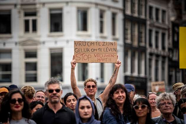 August 15, 2026, Amsterdam, North Holland, The Netherlands Holland: A demonstrator holds a sign reading Ã¢â‚¬oeFree to be! Equal to live! Stop Women-Hate!!Ã¢â‚¬Â (translated from Dutch). August 15, 2026, Amsterdam, The Netherlands. Demonstrators gathered on Dam Square, Amsterdam, in solidarity with Afghan women and girls. The protest marked five years of Taliban rule and demanded access to education for women and girls be restored, and an end to Brussels engagement with the Taliban regime. Amsterdam The Netherlands Holland - ZUMAp202 20260815_zip_p202_003 Copyright: xJamesxPetermeierx