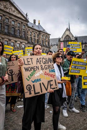 August 15, 2026, Amsterdam, North Holland, The Netherlands Holland: August 15, 2026, Amsterdam, The Netherlands. Demonstrators gathered on Dam Square, Amsterdam, in solidarity with Afghan women and girls. The protest marked five years of Taliban rule and demanded access to education for women and girls be restored, and an end to Brussels engagement with the Taliban regime. Amsterdam The Netherlands Holland - ZUMAp202 20260815_zip_p202_012 Copyright: xJamesxPetermeierx