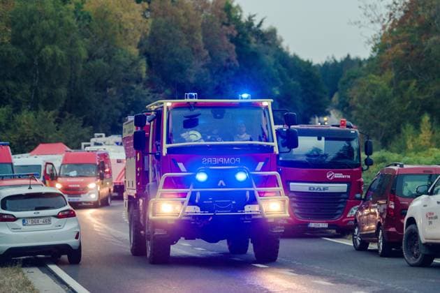 Fire brigade vehicles pictured a fire rages in the Hautes Fagnes (High Fens) nature reserve, on Saturday 15 August 2026 in Waimes. The fire started on August 14th and 1600 hectares (on a total of 4500) are impacted.  NICOLASxLAMBERT 183470581
