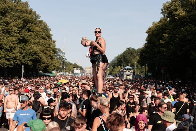 August 15, 2026, Berlin, Germany: A woman dances on an elevated platform above the crowd during the Rave the Planet techno parade in central Berlin. The event took place during a heatwave, with temperatures reaching 31 degrees Celsius. Berlin Germany - ZUMAs197 20260815_aab_s197_026 Copyright: xVasilyxKrestyaninovx