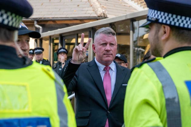 Britain First demo in Maidstone, UK - 15 Aug 2026 Britain First far-right leader, Paul Golding is stopped by police officers to go to the counter-protesters during a demonstration. Around 150 supporters of the Britain First far-right party gathered in Maidstone, UK. The protesters marched through at the town centre led by Paul Golding the current leader of the party. Far-right campaigners were confronted by a group of anti-fascist counter-protesters on the way to the County Hall. Maidstone United Kingdom Copyright: xKrisztianxElekx xSOPAxImagesx SSS_20260815_COUNTER_PROTEST_0011005023