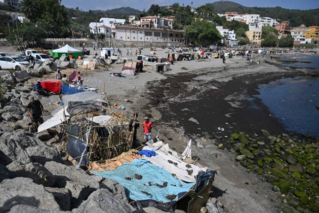 (260815) -- CEUTA, Aug. 15, 2026 -- This photo shows makeshift shelters built by irregular migrants in Ceuta, Spain, Aug. 15, 2026. More than 72,000 migrants crossed irregularly into Ceuta from neighboring Morocco on July 30 and 31, according to the Spanish government. Most returned to Morocco later, while thousands remain in the enclave.Security was also tightened along the border ahead of Saturday after calls for another mass crossing circulated on social media. Moroccan security forces intercepted hundreds of migrants attempting to reach the border area, while Ceuta reported no influx on a scale comparable to that seen in late July. ) SPAIN-CEUTA-VIEW ChengxMin 