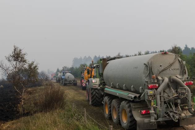 Emergency services pictured on the site, as a fire rages in the Hautes Fagnes (High Fens) nature reserve, on Sunday 16 August 2026 in Waimes. The fire started on August 14th and 2700 hectares (on a total of 4500) are impacted.  NICOLASxLAMBERT 183533021