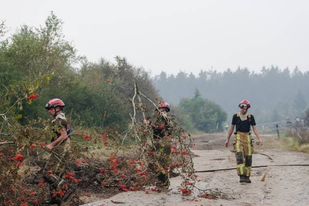 Firefighters in action on the scene of a fire rages in the Hautes Fagnes (High Fens) nature reserve, on Sunday 16 August 2026 in Waimes. The fire started on August 14th and 2700 hectares (on a total of 4500) are impacted.  NICOLASxLAMBERT 183533906
