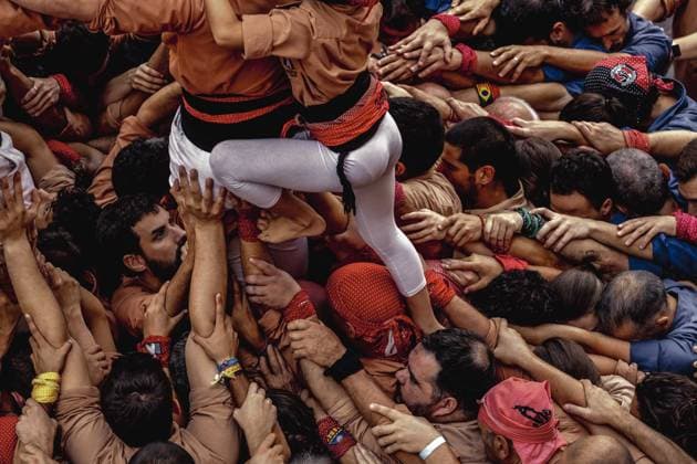 August 16, 2026, Barcelona, Catalonia, Spain: Members of the Xiquets de Reus gather to form the pinya , the base that supports a human tower, during the Festa Major de Gro cia. Barcelona Spain - ZUMAo105 20260816_fap_o105_004 Copyright: xMatthiasxOesterlex