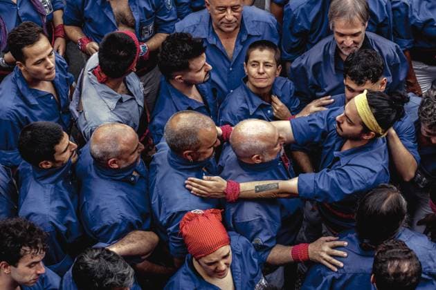 August 16, 2026, Barcelona, Catalonia, Spain: Members of the Castellers de la Vila de Gracia gather to form the pinya , the base that supports a human tower, during the Festa Major de Gro cia. Barcelona Spain - ZUMAo105 20260816_fap_o105_006 Copyright: xMatthiasxOesterlex