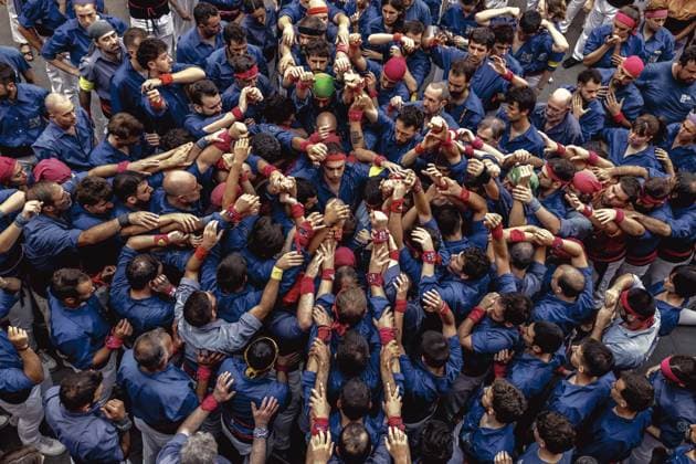 August 16, 2026, Barcelona, Catalonia, Spain: Members of the Castellers de la Vila de Gracia gather to form the pinya , the base that supports a human tower, during the Festa Major de Gro cia. Barcelona Spain - ZUMAo105 20260816_fap_o105_048 Copyright: xMatthiasxOesterlex