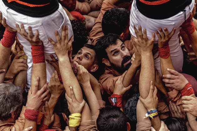 August 16, 2026, Barcelona, Catalonia, Spain: Members of the Xiquets de Reus gather to form the pinya , the base that supports a human tower, during the Festa Major de Gracia. Barcelona Spain - ZUMAo105 20260816_fap_o105_005 Copyright: xMatthiasxOesterlex