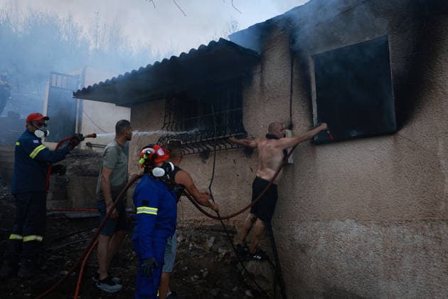 Wildfire kills 2 on Greek island of Salamina near Athens ATHENS, GREECE - AUGUST 16: Firefighters try to extinguish a wildfire which broke out on the island of Salamina, west of Athens, Greece, on August 16, 2026. Two people were found dead in a forested area of Peristeria on the Greek island of Salamina, where a wildfire broke out around noon Sunday, local media reported. Costas Baltas Anadolu Athens Greece. Editorial use only. Please get in touch for any other usage.  Copyright: x2026xAnadoluxCostasxBaltasx