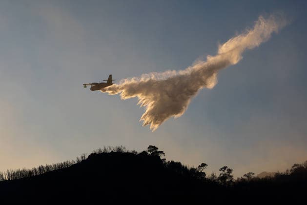 Wildfire kills 2 on Greek island of Salamina near Athens ATHENS, GREECE - AUGUST 16: Firefighters try to extinguish a wildfire which broke out on the island of Salamina, west of Athens, Greece, on August 16, 2026. Two people were found dead in a forested area of Peristeria on the Greek island of Salamina, where a wildfire broke out around noon Sunday, local media reported. Costas Baltas Anadolu Athens Greece. Editorial use only. Please get in touch for any other usage.  Copyright: x2026xAnadoluxCostasxBaltasx