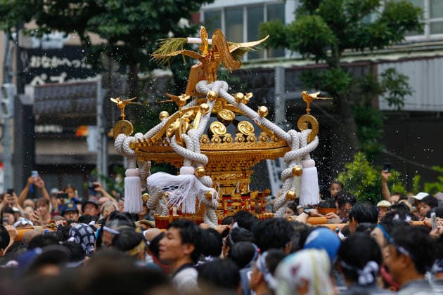 August 16, 2026, Tokyo, Japan: Participants seen carrying a heavily decorated mikoshi (portable shrine) in Koto Ward during the Fukagawa Hachiman Festival. The triennial festival is one of Tokyo s top three major Edo-period festivals held at Tomioka Hachimangu Shrine. It is well known as the Water-Splashing Festival (Mizukake Matsuri), where participants toss gallons of purifying water onto shrine bearers to beat the intense midsummer heat and bless the local community. Tokyo Japan - ZUMAs197 20260816_aaa_s197_053 Copyright: xRodrigoxReyesxMarinx