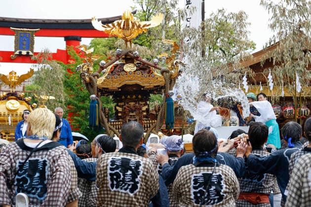 August 16, 2026, Tokyo, Japan: Participants seen carrying a heavily decorated mikoshi (portable shrine) through a cascade of splashing water in Koto Ward during the Fukagawa Hachiman Festival. The triennial festival is one of Tokyo s top three major Edo-period festivals held at Tomioka Hachimangu Shrine. It is well known as the Water-Splashing Festival (Mizukake Matsuri), where participants toss gallons of purifying water onto shrine bearers to beat the intense midsummer heat and bless the local community. Tokyo Japan - ZUMAs197 20260816_aaa_s197_077 Copyright: xRodrigoxReyesxMarinx