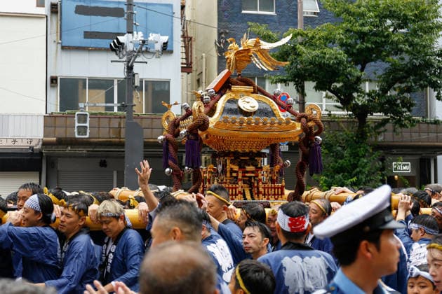 August 16, 2026, Tokyo, Japan: Participants seen carrying a heavily decorated mikoshi (portable shrine) in Koto Ward during the Fukagawa Hachiman Festival. The triennial festival is one of Tokyo s top three major Edo-period festivals held at Tomioka Hachimangu Shrine. It is well known as the Water-Splashing Festival (Mizukake Matsuri), where participants toss gallons of purifying water onto shrine bearers to beat the intense midsummer heat and bless the local community. Tokyo Japan - ZUMAs197 20260816_aaa_s197_086 Copyright: xRodrigoxReyesxMarinx
