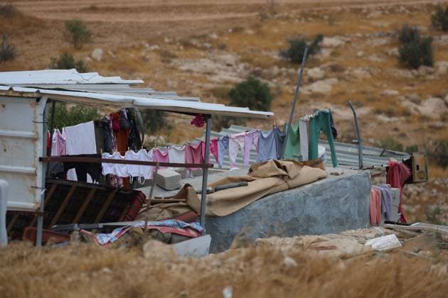 August 16, 2026, Masafer Yatta, Palestine, State of: MASAFER YATTA, WEST BANK, PALESTINE, AUGUST 16, 2026: Palestinian Abdullah Dababseh holds his phone displaying a demolition order issued by the Israeli army for the cave where he lives in Khirbet Khallet Al-Dabaa, south of Hebron. According to local residents, demolition orders were issued for three homes, three caves, a school, trees and crops in the area. Residents said the village was demolished in May 2025, forcing some Palestinians to live in caves. Masafer Yatta Palestine, State of - ZUMAq101 20260816_zna_q101_104 Copyright: xMosabxShawerx