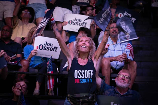 August 16, 2026, Atlanta, Georgia, USA: A supporter dances to the music before a capacity-crowd rally in Atlanta Sunday for Sen. Jon Ossoff, Atlanta USA  - ZUMAn03_ 20260816_zaf_n03_016 Copyright: xRobinxRaynex
