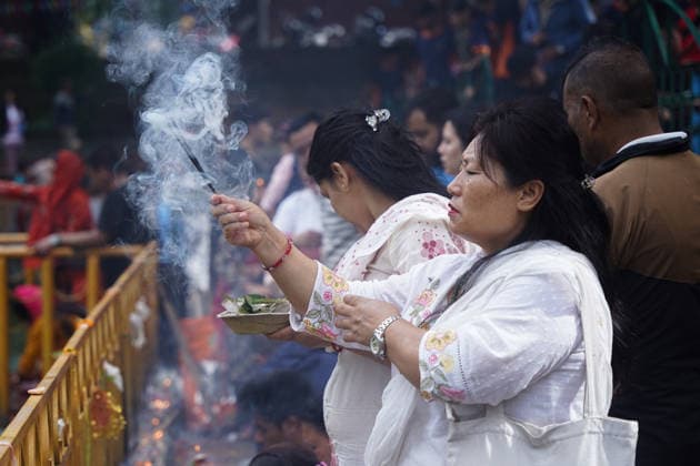 August 17, 2026, Kathmandu, Bagmati, Nepal: The Naag Panchami festival is being celebrated today with traditional worship and offerings to serpents. Observed annually on the fifth day of the bright fortnight of the month of Shrawan, this festival involves pasting images of serpents on the main entrance of homes and visiting serpent ponds (Naagdah) for worship. A woman praying to the Serpent Deity. Kathmandu Nepal  - ZUMAa308 20260817_znp_a308_001 Copyright: xChandraxBahadurxAlex