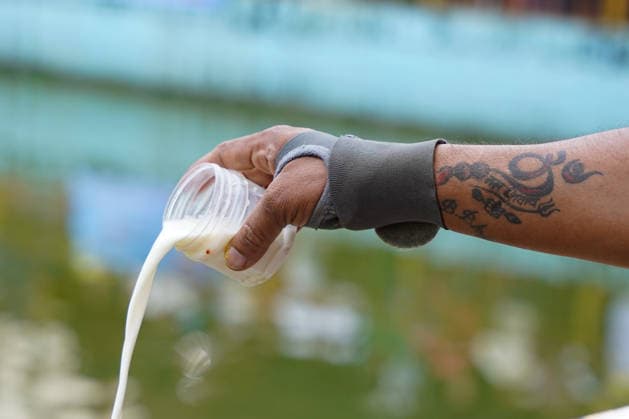 August 17, 2026, Kathmandu, Bagmati, Nepal: A devotee offers milk at a sacred pond during Nag Panchami, a Hindu festival dedicated to the worship of serpent deities. Kathmandu Nepal - ZUMAa308 20260817_znp_a308_008 Copyright: xChandraxBahadurxAlex