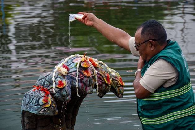 August 17, 2026, Kathmandu, Nepal: KATHMANDU, NEPAL Ã¢â‚¬ AUGUST 17, 2026: Hindu devotees offer prayers to a statue representing Nag, a serpent deity, at Taudaha Pond in Kathmandu, Nepal, on August 17, 2026, during celebrations of Nag Panchami. The Hindu festival, observed during the monsoon season, is dedicated to the worship of serpent deities, with devotees making prayers and ritual offerings. Kathmandu Nepal  - ZUMAq101 20260817_zna_q101_004 Copyright: xSunilxPradhanx