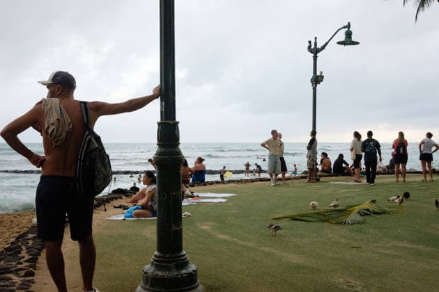 August 16, 2026, Honolulu, Hawaii, USA: Tropical storm LalaÃ¢â‚¬â ¢s worst affected Oahu and Waikiki beginning after 1:00 a.m. Sunday August 16, 2026 and lasted, tapering, through mid-afternoon leaving behind flooding, downed trees, and more than 130,000 Hawaiian Electric customers without power at 4:00 p.m. But at sunset Waikiki Beach was packed with people taking advantage of a brief respite from the rain that the National Weather Service forecasts will last through the week as the slow-moving storm moves Northwest beneath the Hawaiian archipelago. Schools, government offices and many businesses will remain closed on Monday as people on OÃ¢â‚¬Ëœahu sort through the stormÃ¢â‚¬â ¢s consequences. Honolulu USA - ZUMAm255 20260816_znp_m255_008 Copyright: xJ.xMattx