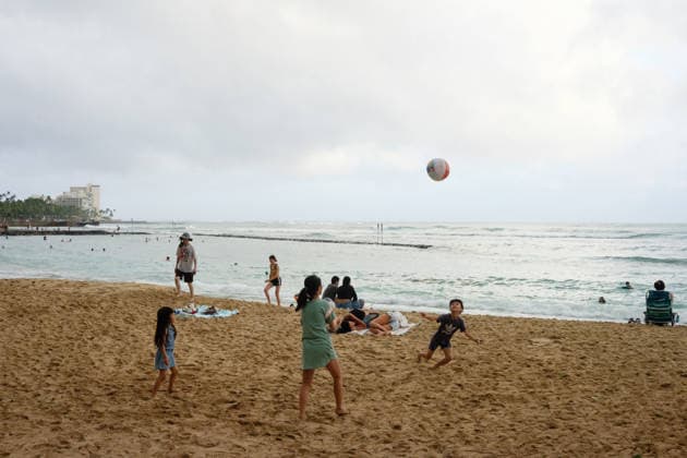 August 16, 2026, Honolulu, Hawaii, USA: Tropical storm LalaÃ¢â‚¬â ¢s worst affected Oahu and Waikiki beginning after 1:00 a.m. Sunday August 16, 2026 and lasted, tapering, through mid-afternoon leaving behind flooding, downed trees, and more than 130,000 Hawaiian Electric customers without power at 4:00 p.m. But at sunset Waikiki Beach was packed with people taking advantage of a brief respite from the rain that the National Weather Service forecasts will last through the week as the slow-moving storm moves Northwest beneath the Hawaiian archipelago. Schools, government offices and many businesses will remain closed on Monday as people on OÃ¢â‚¬Ëœahu sort through the stormÃ¢â‚¬â ¢s consequences. Honolulu USA - ZUMAm255 20260816_znp_m255_010 Copyright: xJ.xMattx